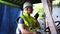 Portrait of an electrician working in an industry. Staff driving a forklift in an industrial factory