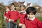 Portrait Of Elementary School Pupils On Climbing Equipment