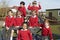 Portrait Of Elementary School Pupils On Climbing Equipment