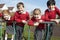 Portrait Of Elementary School Pupils On Climbing Equipment