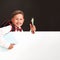 Portrait of an emotional child. boy-schoolboy smiles, happy to return to school. concepts about the student. holding white Banner