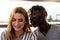 portrait of an engaged multiethnic couple having fun on summer vacation on a river ship