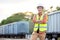 Portrait Engineer man working on railway. Chief Engineer in the Hard Hat in maintenance facility, Engineer and repair man concept