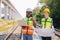 Portrait engineer railway tracks service team working on site together survey check maintenance inspection train track for