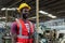 Portrait engineering male african american happy smiling workers wear yellow hard hat red uniform standing at factory industrial.