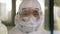 Portrait of epidemiologist protecting patients from coronavirus COVID-19 in mask