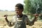 Portrait Ethiopian Oromo boy with stick