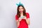 Portrait of excited crazy funny ginger hair girl use smartphone play video online social media games wear good look blue