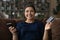 Portrait of excited Indian woman shopping on cellphone