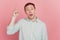 Portrait of excited shocked genius smart guy raise finger have brilliant idea on pink background