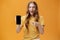 Portrait of excited woman feeling amazed holding awesome new smartphone in hand pointing at cellphone screen popping