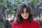 Portrait of exquisite beautiful young girl in a red blouse. Beau