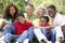 Portrait Of Extended Family Group In Park