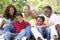 Portrait Of Extended Family Group In Park