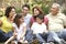 Portrait Of Extended Family Group In Park