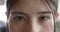 Portrait of eyes of happy asian casual businesswoman in slow motion