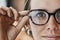 Portrait, eyes and woman with glasses for optical healthcare, prescription or perception. Female, face and spectacles of