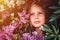 portrait face of candid beautiful little kid girl of eight years old with brown eyes on