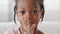 Portrait face child african american little girl looking at camera waving hello greeting, webcam view ethnic baby