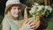 Portrait of a fair-haired girl of seven years with a basket of wildflowers