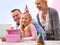 Portrait, family or cake at happy birthday, party or candle as love, bonding or together outside. Papa, mama or girl as