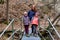 Portrait of family on hiking forest trip with hiking clothes