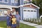 Portrait Of Family Standing Outside House