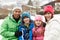 Portrait Of Family Wearing Winter Clothes