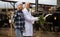 Portrait of Farm employees working in livestock barn