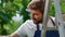 Portrait farmer picking berry branches in natural farmland plantation smiling