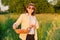 Portrait of farmer woman in hat with basket of fresh egg