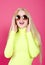 Portrait of fashion blonde laughing smiling model girl young woman wearing stylish with sunglasse 