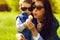 Portrait of fashionable baby boy and his gorgeous mother