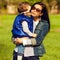 Portrait of fashionable baby boy and his gorgeous mother