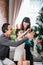 Portrait of Father, Mother, and his daughter install Christmas t