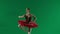 Portrait of female on chroma key green screen background. Close up shot ballerina in red tutu and dark body performing