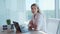 Portrait of female concentrated employee. Business woman thinking in office.