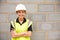 Portrait Of Female Construction Worker On Building Site