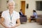 Portrait Of Female Consultant In Hospital Reception