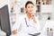 Portrait of female doctor in hospital interior