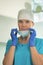 Portrait of female doctor removing surgical mask at clinic