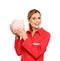 Portrait of female emergency doctor with piggy bank
