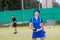 Portrait of female and male tennis players playing doubles outdo