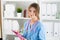 Portrait of female medicine therapeutist doctor holding clipboard