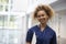 Portrait Of Female Nurse Wearing Scrubs In Hospital