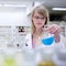 Portrait of a female researcher doing research