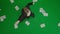 Portrait of female in suit on chroma key green screen. Top view business woman frustrated throwing paper documents and