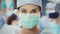Portrait of female surgeon at operating room