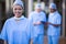 Portrait of female surgeon smiling at camera