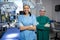 Portrait of a female surgeons standing in operation theater